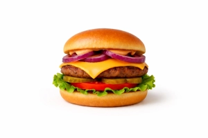 100% rundvlees burger (125 gr.) op een luxe broodje met cheddar, gebakken ui, sla, tomaat, augurk en westersaus