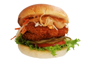 Malse chicken burger (125 gr.) van 100% kipfilet op een luxe broodje met cheddar, sla, coleslaw, tomaat, augurk en classicsaus